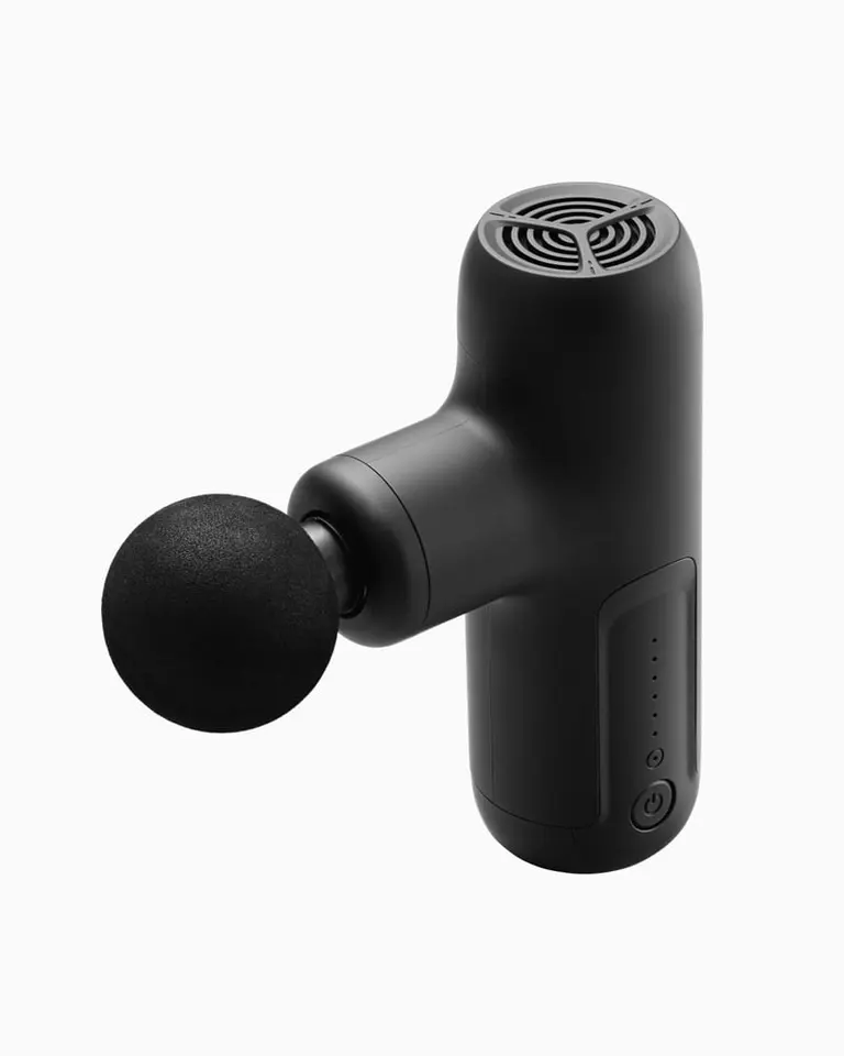 Black Flowgun Air percussive massage gun with a round ball head attachment, shown from a compact angled profile.