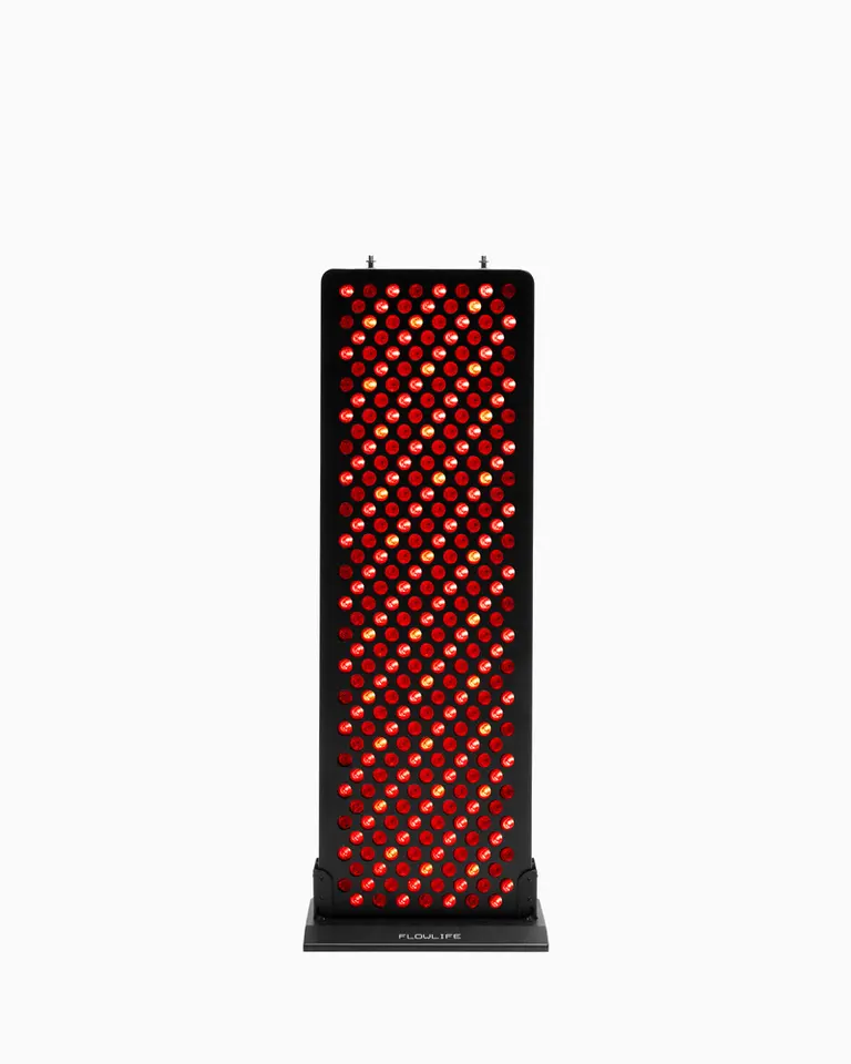 Front view of the black Flowlight 1500 Seven Waves panel, featuring 300 illuminated red light therapy LEDs.