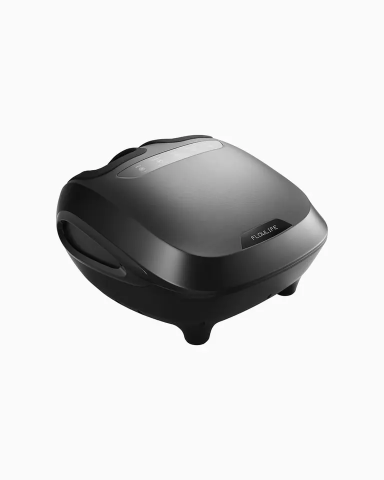 Black Flowfeet foot massager featuring a top control panel and sleek design, shown from an angled studio perspective.
