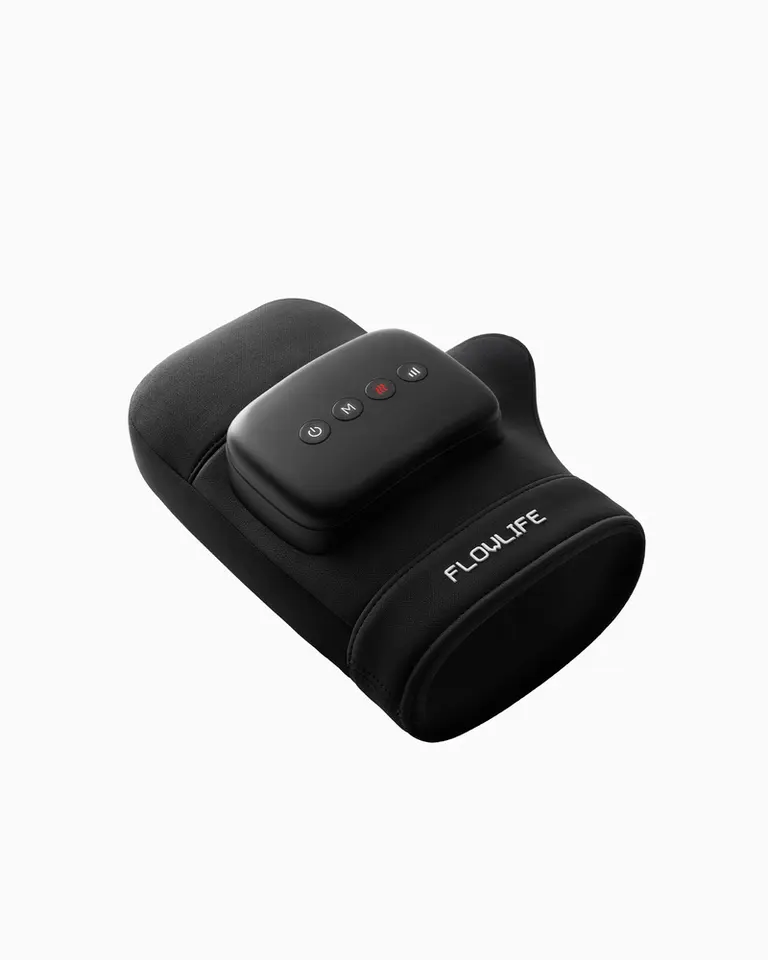 Black Flowpression Hand compression massager with control buttons, shown from an angled top view on a white background.