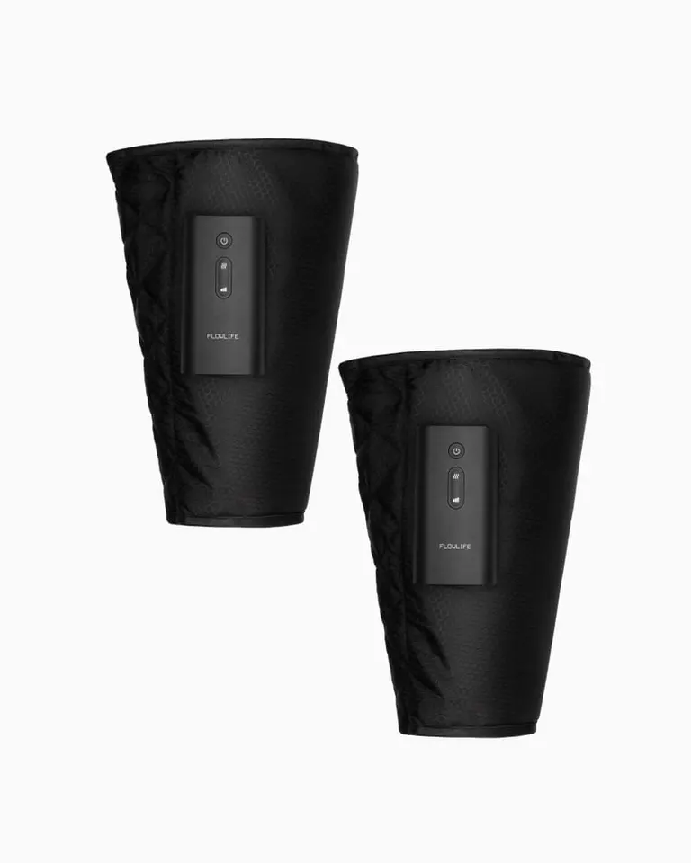 Pair of black Flowpression Calf DUO sleeves with integrated cordless controls for dynamic air compression and heat.