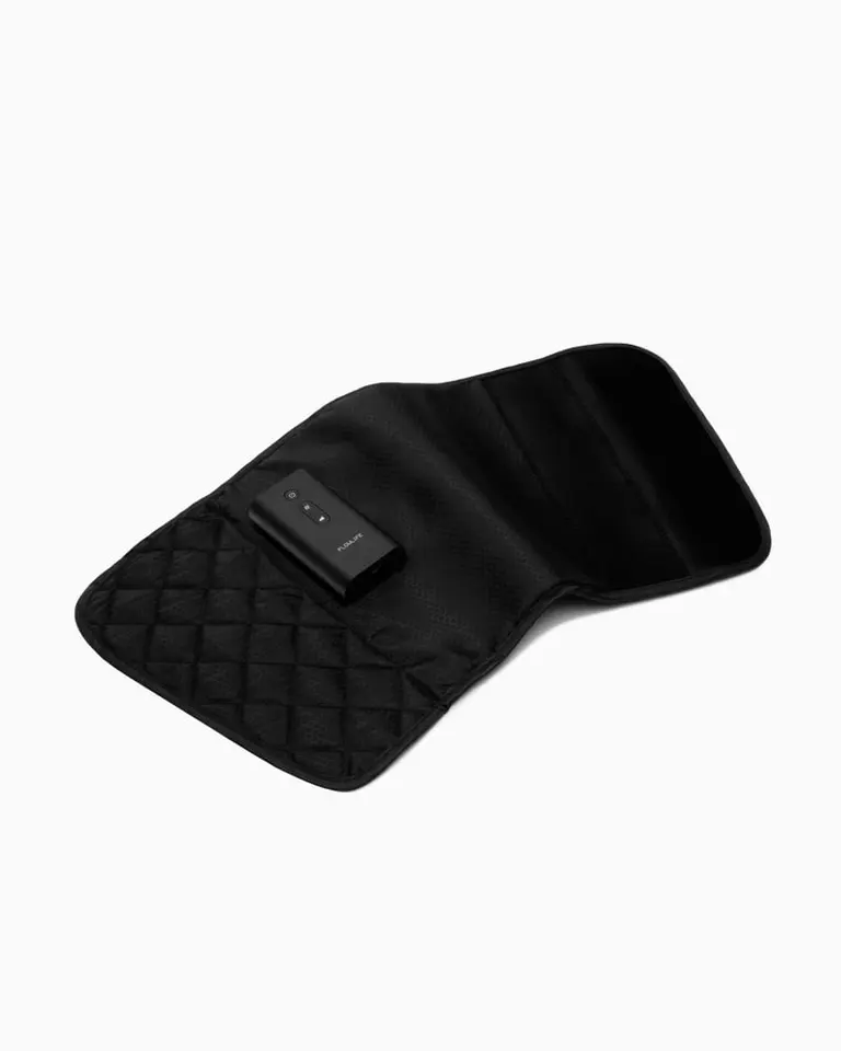 Flowpression Calf Duo shown open and flat, featuring black quilted material and an integrated cordless control module.