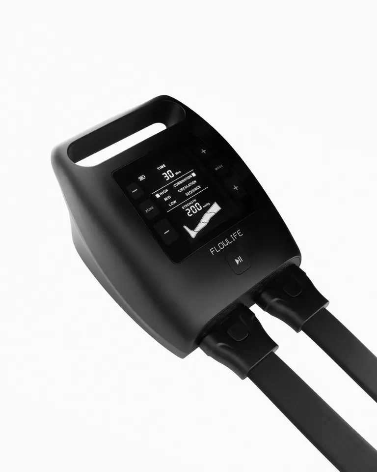 Matte black control unit for Flowpression Boots Pro+ with a digital screen showing compression modes and intensity.