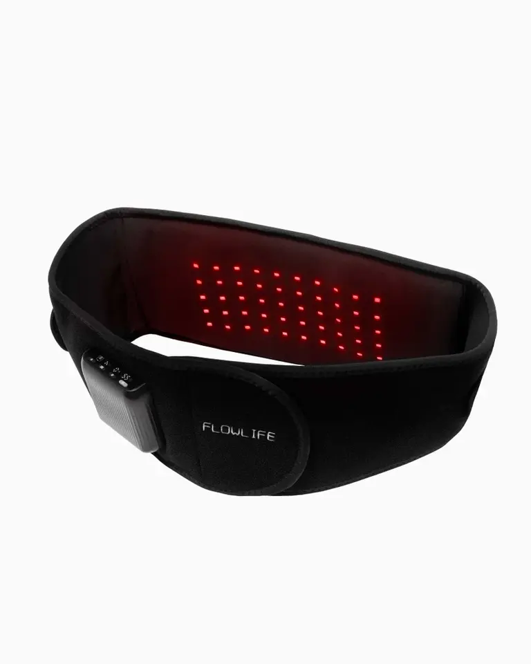 Black Flowtherma Belt featuring integrated red light therapy LEDs and a control module for targeted back recovery.