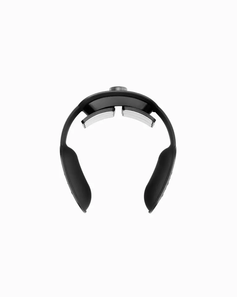 Flowtens Neck in a top-down view with black ergonomic casing, metallic electrode pads, and a silver rotating crown.