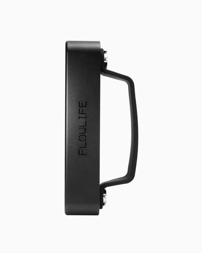 Side profile of the black Flowlight Panel Go 60 Two Waves, a portable red light therapy panel with an integrated handle.