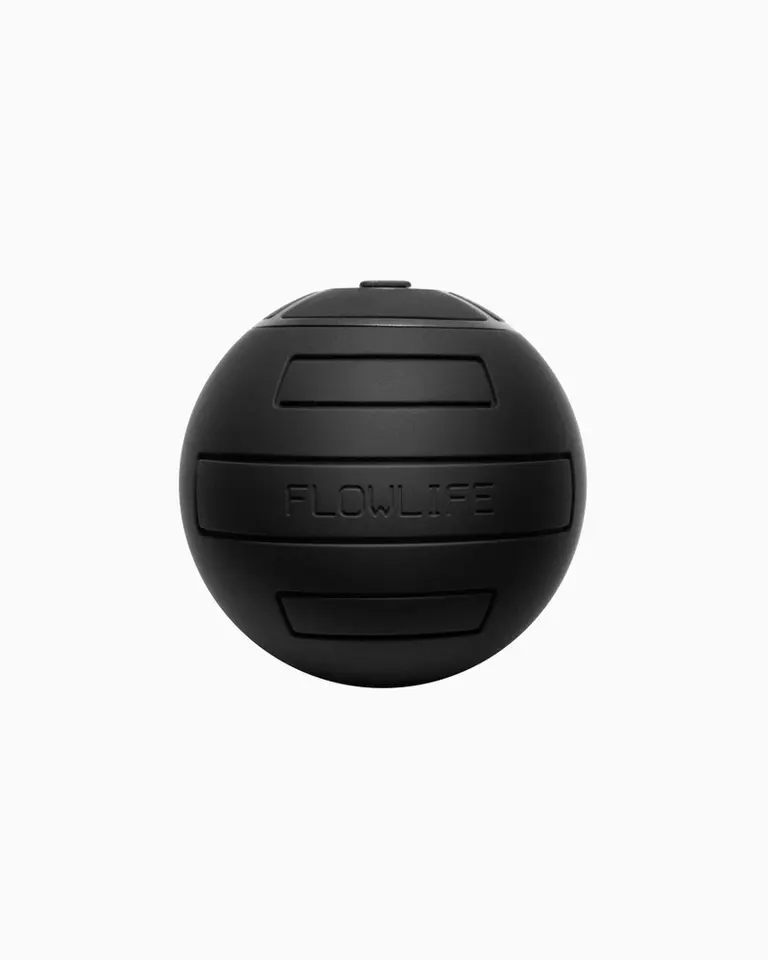 Flowroller Ball Go 80 mm vibration massage ball in black silicone, designed for precise trigger point release.