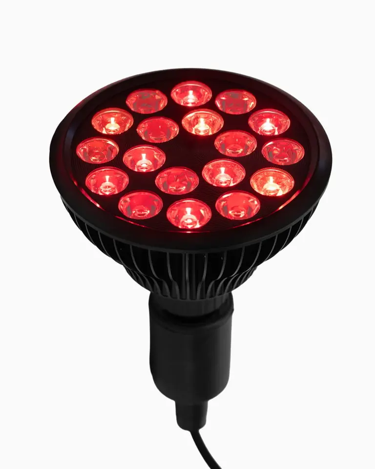 Flowlight Bulb 50 Six Waves with illuminated red LEDs in a black housing for targeted red and near-infrared therapy.