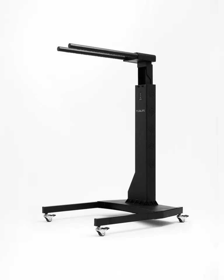 Flowlight Auto Static Stand in black, featuring a motorized lifting column and a rolling base with swivel casters.