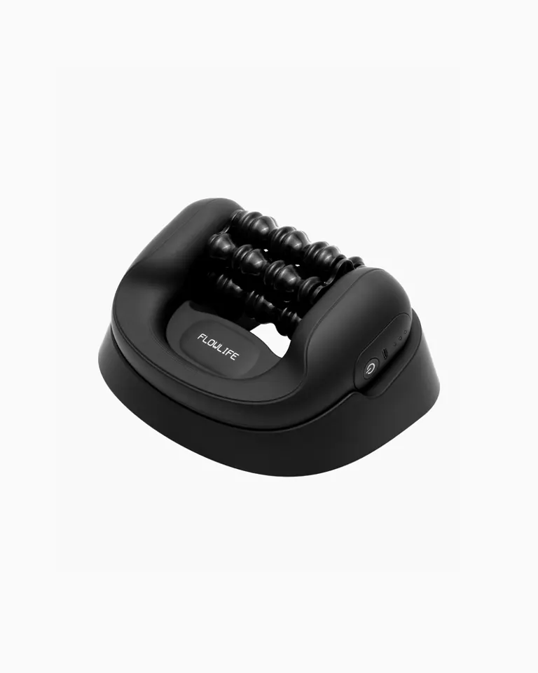 Flowlymph Roller Go mounted in its black stand showcasing the percussive massage roller for targeted lymphatic drainage.